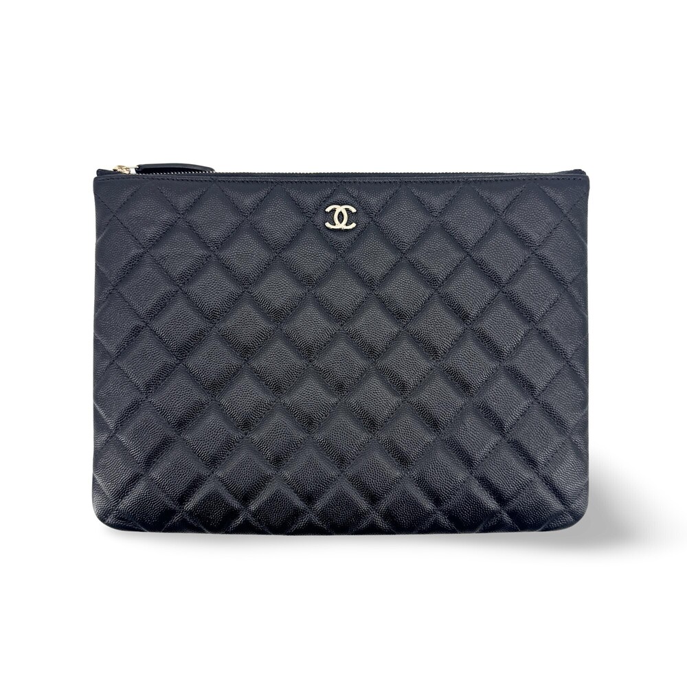 Chanel O Case Clutch Quilted Caviar Medium